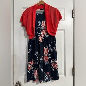 Stretchy rayon knee length dress, size large. Includes matching coral shrug.